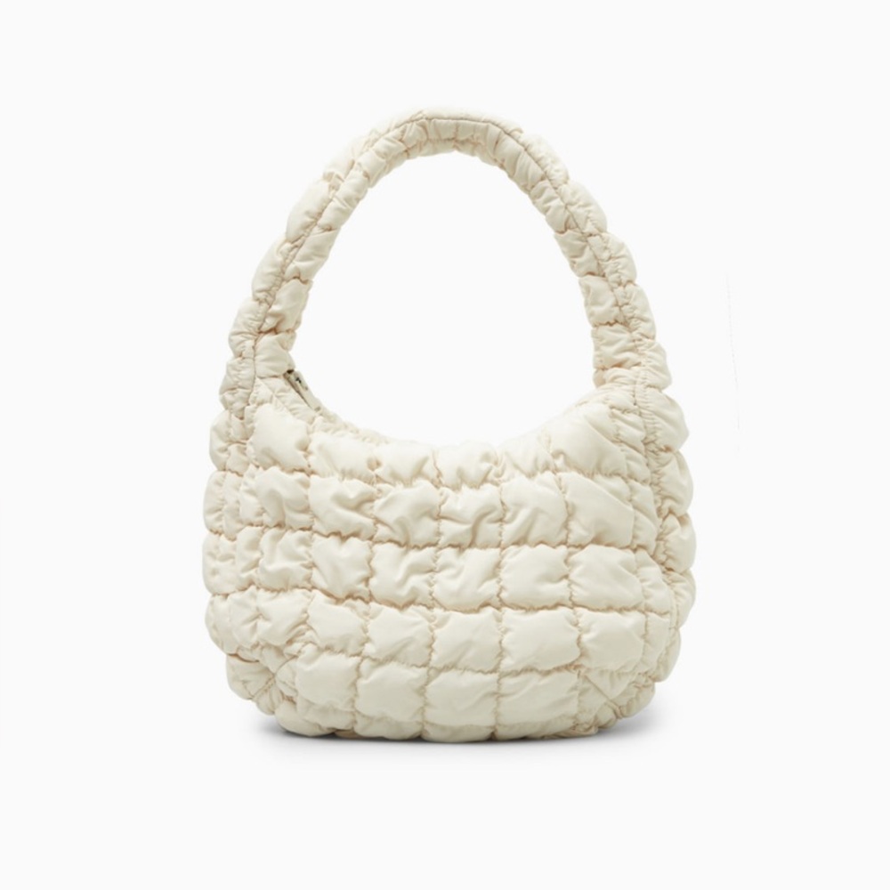 NWT COS Quilted Mini Bag

Elegant Cream Quilted Women's Bag